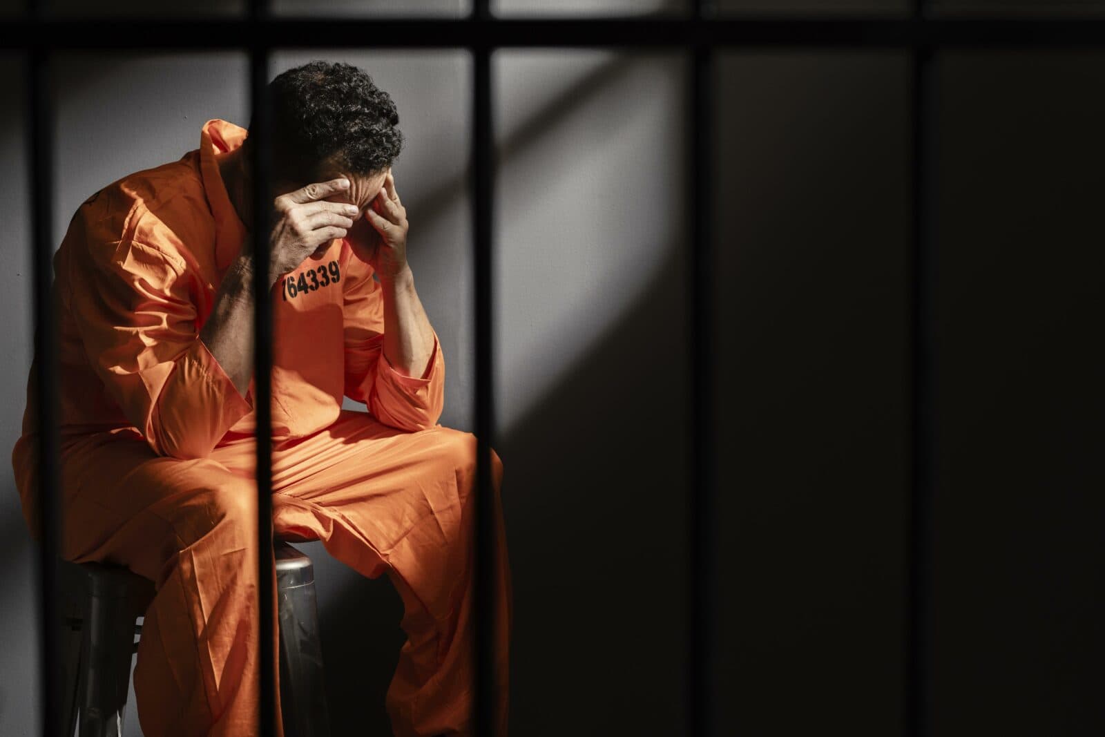 middle aged man spending time jail